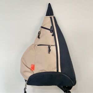 AMPAC Sling Messenger Khaki and Black Backpack 
Unisex